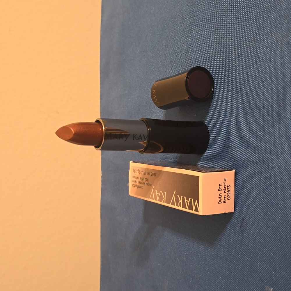Marykay's original formula Downtown Brown cream lipstick.
